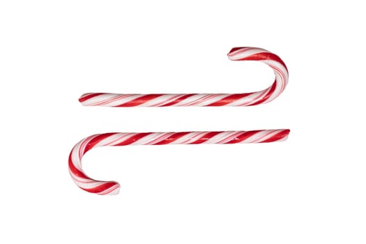 Traditional Christmas striped candy cane isolated on a white background. Top view.