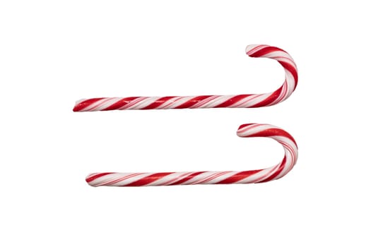 Traditional Christmas striped candy cane isolated on a white background. Top view.