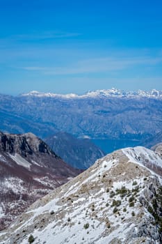 Kotor Bay and stunning mountain winter landscape as seen from the top of Mount Lovcen in Lovcen National Park, Montenegro