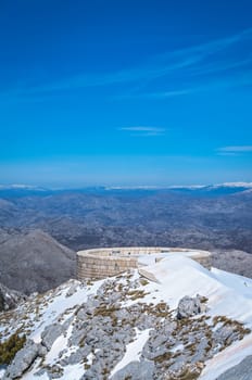 Njegos mausoleum and the stunning mountain winter landscape as seen from the top of Mount Lovcen in Lovcen National Park, Montenegro