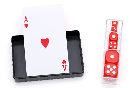 Playing cards and dice for game on white background