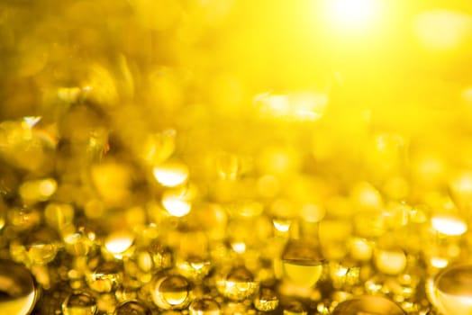 Gold bokeh background with light.