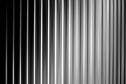 An abstract black white and gray striped surface with shadows and vignettes.....