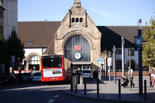 Worms, Germany - October 13, 2018: Bus and road traffic in front of the main train station on October 13, 2018 in Worms..