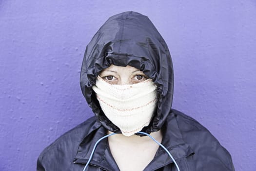 Aggressive hooded woman, violence and lifestyle