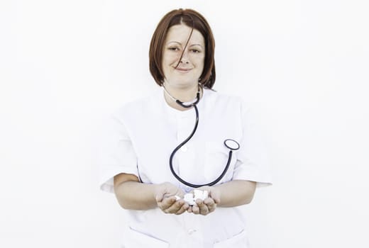 Nurse with stethoscope wearing gown, medicine and health
