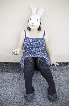 Girl in halloween rabbit mask, fear and terror