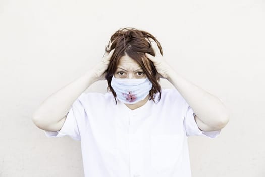 Crazy nurse with bloody mask, halloween