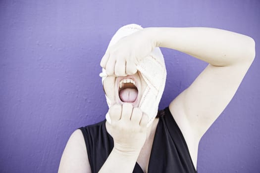 Woman pulling headband with anxiety, fear and condition
