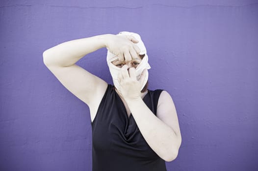 Woman pulling headband with anxiety, fear and condition