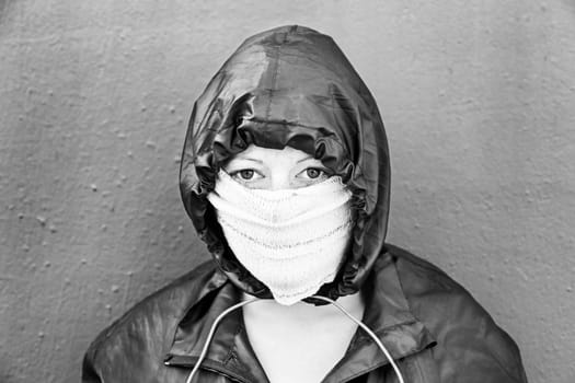 Aggressive hooded woman, violence and lifestyle