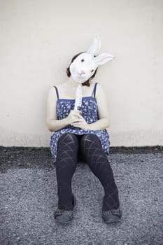 Girl in halloween rabbit mask, fear and terror