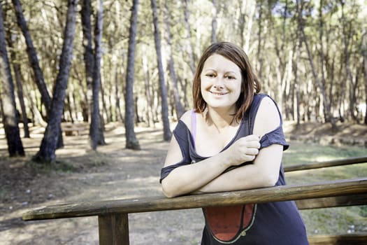 Girl in forest with trees, nature and outdoor