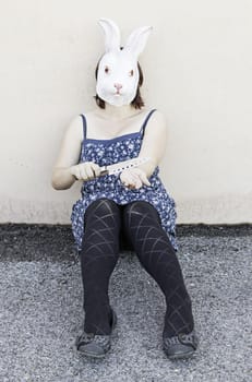 Girl in halloween rabbit mask, fear and terror