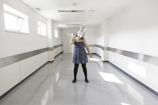 Girl in halloween rabbit mask, fear and terror