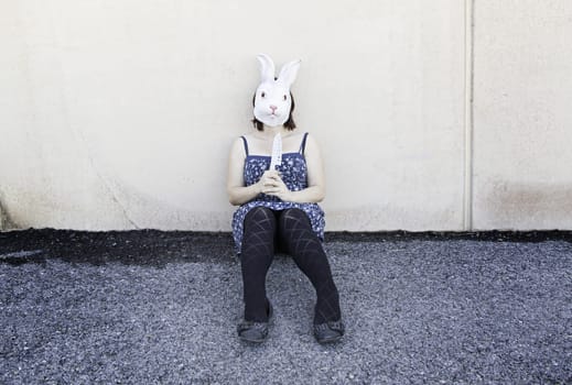Girl in halloween rabbit mask, fear and terror