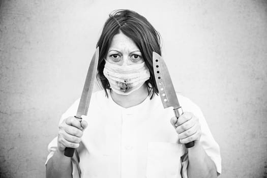 Nurse with knives and bloody mask, halloween
