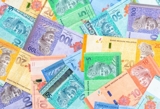 Malaysia currency of Malaysian ringgit banknotes background. Paper money of one, five, ten, twenty, fifty and hundred ringgit notes. Financial concept.