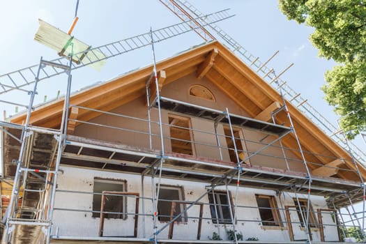 Loft conversion, renovation, renovation and dismantled windows on a construction site.