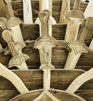 Medieval wooden swords in recreation, war and guns