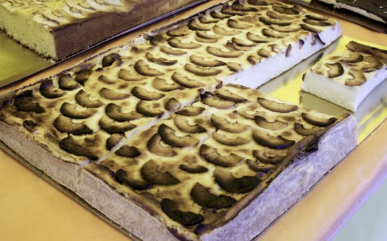 Apple pie caramelized in food market, pastry shop