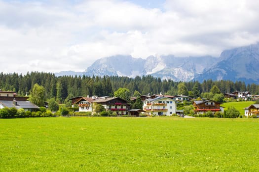 a beautiful view of the austrian alps and Oberndorf in Tirol, Austria