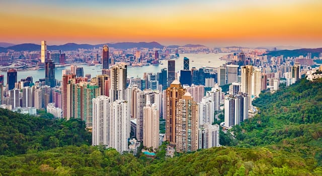 Hong Kong skyline at sunset. View from Victoria peak. Panorama