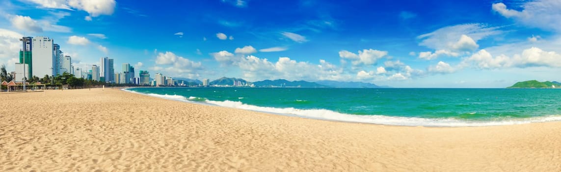 Scenic view of Nha Trang beach at sunny day. Beautiful tropical landscape. Panorama