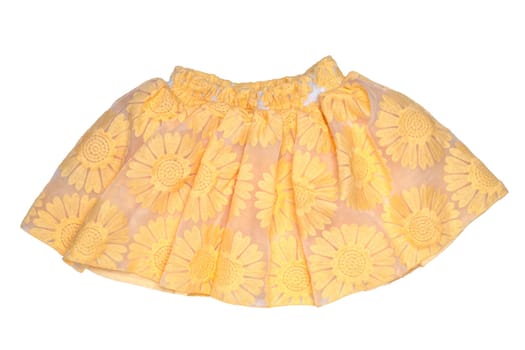 Girls clothes. Festive beautiful yellow little girl short summer skirt with floral pattern and a golden ribbon bow isolated on a white background. Children and kids fashion.