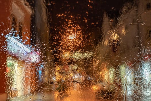 Rain - Winter Depression - View wet car window in the dark