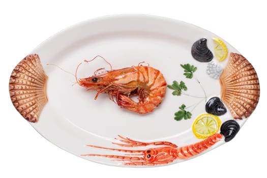 Seafood background. Closeup of one fresh grilled big prawn tiger or shrimps on a colorful seafood plate isolated on a white background. Concept healthy food. BBQ.