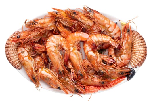 Seafood background. Closeup of fresh grilled big prawn tiger or shrimps on a colorful seafood plate isolated on a white background. Concept healthy food. BBQ.