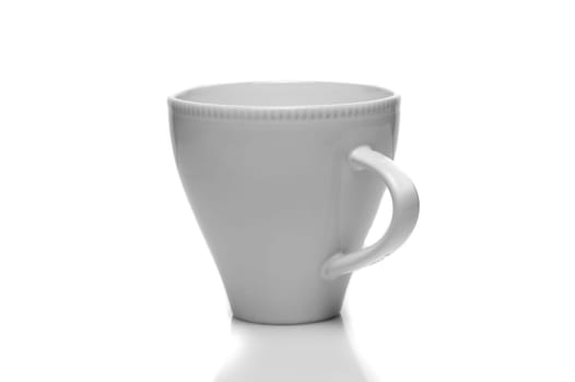 white dishes on a white background, a teacup