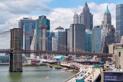 New York, USA - May 24, 2018: View of Manhattan skyline and Brooklyn Bridge in daytime