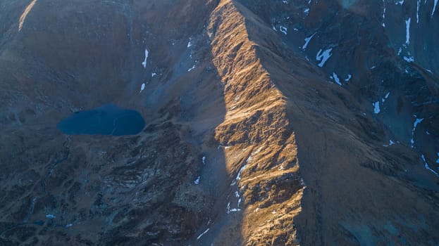 The Urlea lake in Fagaras Mountains, Romania. Aerial view