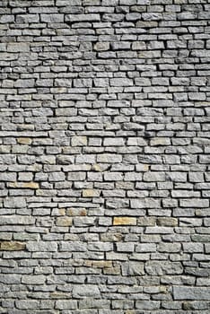 Gray stone wall from an old house