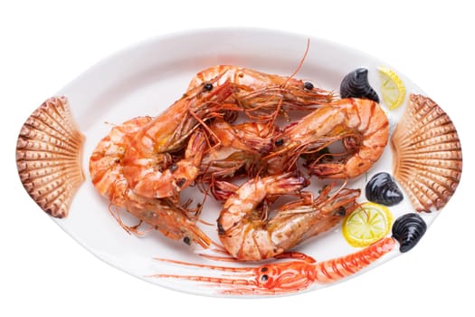Seafood background. Closeup of fresh grilled big prawn tiger or shrimps on a colorful seafood plate isolated on a white background. Concept healthy food. BBQ.