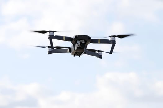 drone flying in air and sky in the background