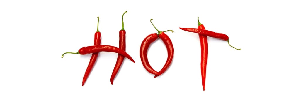 Red chili on paper white background