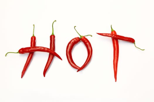 Red chili on paper white background
