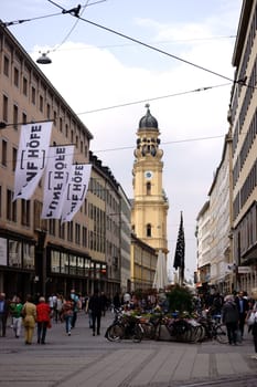 Munich, Germany - June 29, 2018: The Theatiner-Street a well-visited shopping street in the old town on June 29, 2018 in Munich..