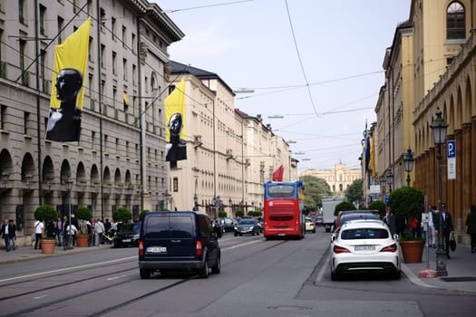 Munich, Germany - June 30, 2018: Road traffic with cars and buses on Maximilian-Street in the city center on June 30, 2018 in Munich..