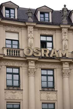 Munich, Germany - June 29, 2018: The logo of the company Osram a producer of bulbs at a historic building in the old town on June 29, 2018 in Munich..