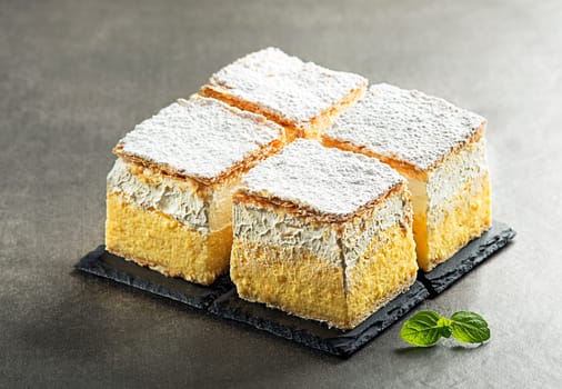 Traditional Slovenian dessert - slice of cream cake called Kremna Rezina or Kremsnita.Bled lake,Slovenia,Europe - Image