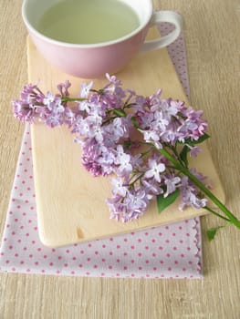 Lilac tea and lilac flowers