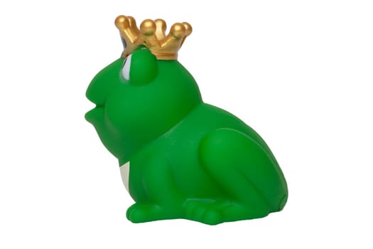 Rubber frog toys. Funny cute rubber green frog king or frog prince toy isolated on a white background. Macro.