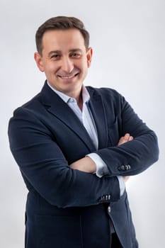 Portrait of a handsome CEO in a blue suit and smiling