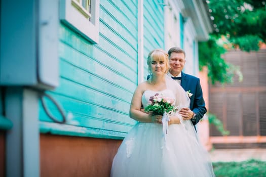bride and groom on the background of the city.