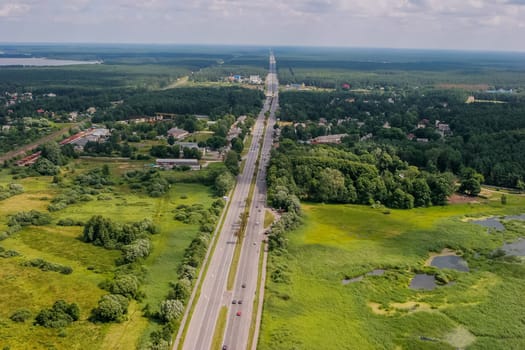 Aerial view of road in Latvia. Latvia from above.