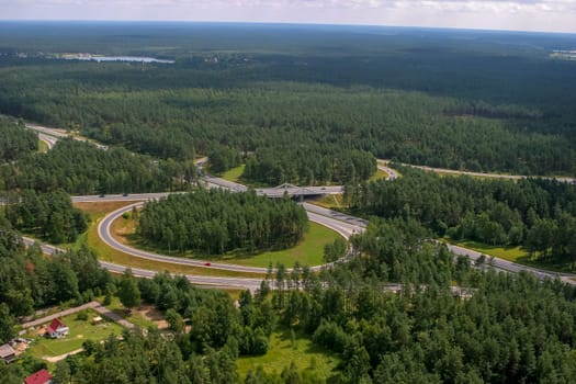 Aerial view of road in Latvia. Latvia from above.